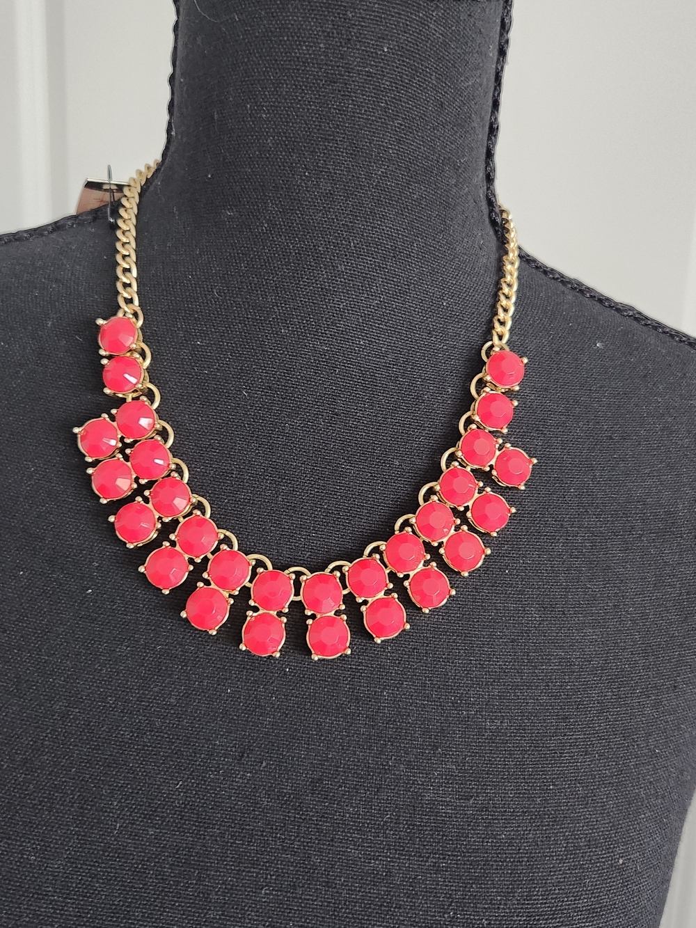 Gold-Tone Necklace with Vibrant Red Gem Accents